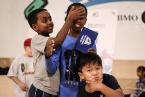 Children in gymnasium playing