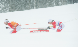 Robbi Weldon competes with guide in Para nordic Sochi Paralympics